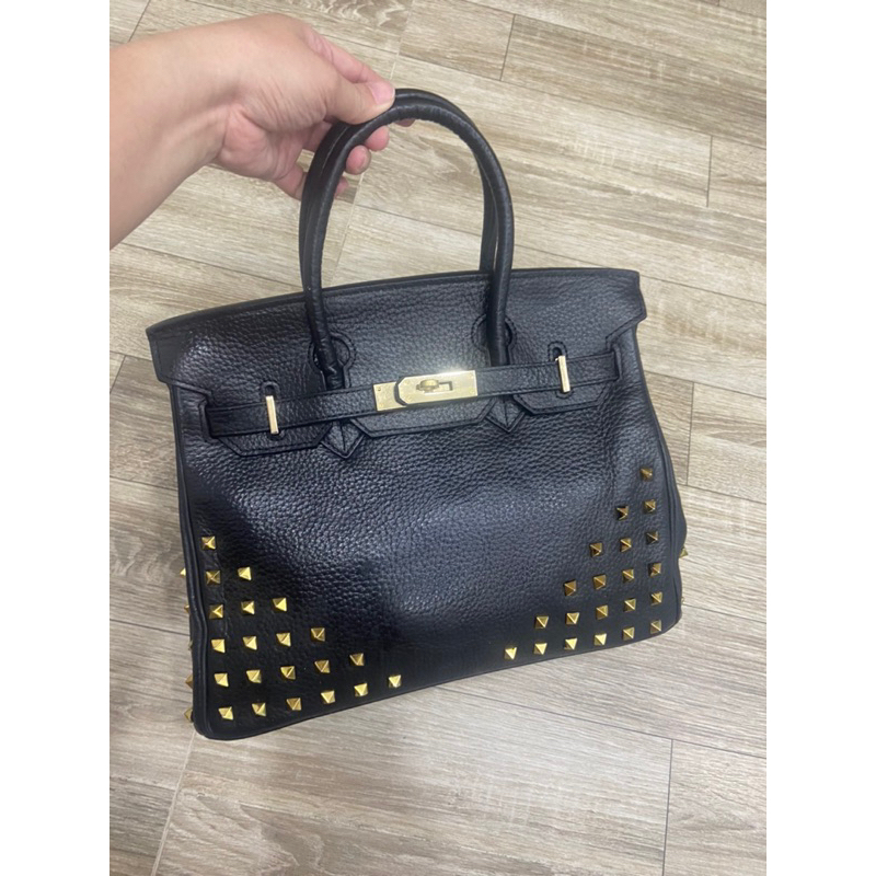 Túi da thật dáng HM