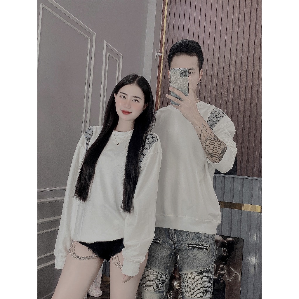 Áo nỉ thu đông thêu chữ B ở cầu vai nam nữ đều mặc được 2 màu trắng và đen