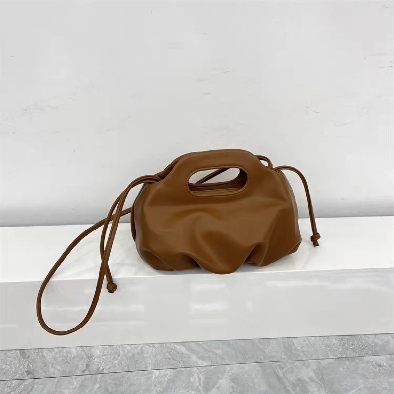 Túi xách nữ bản dẹt dây rút da PU