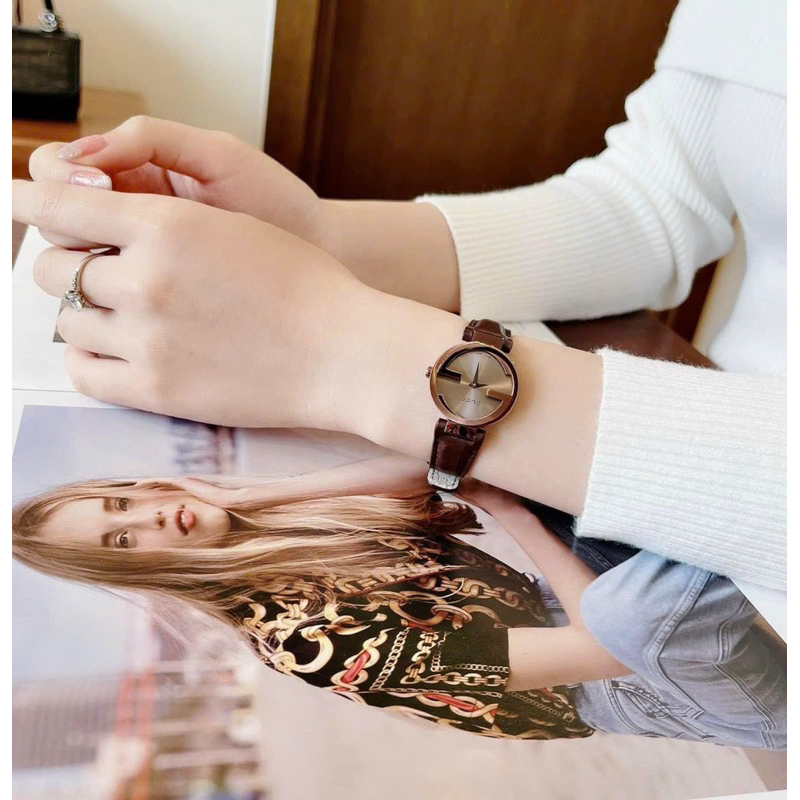 Đồng hồ nữ Guccii mặt tròn dây da nâu