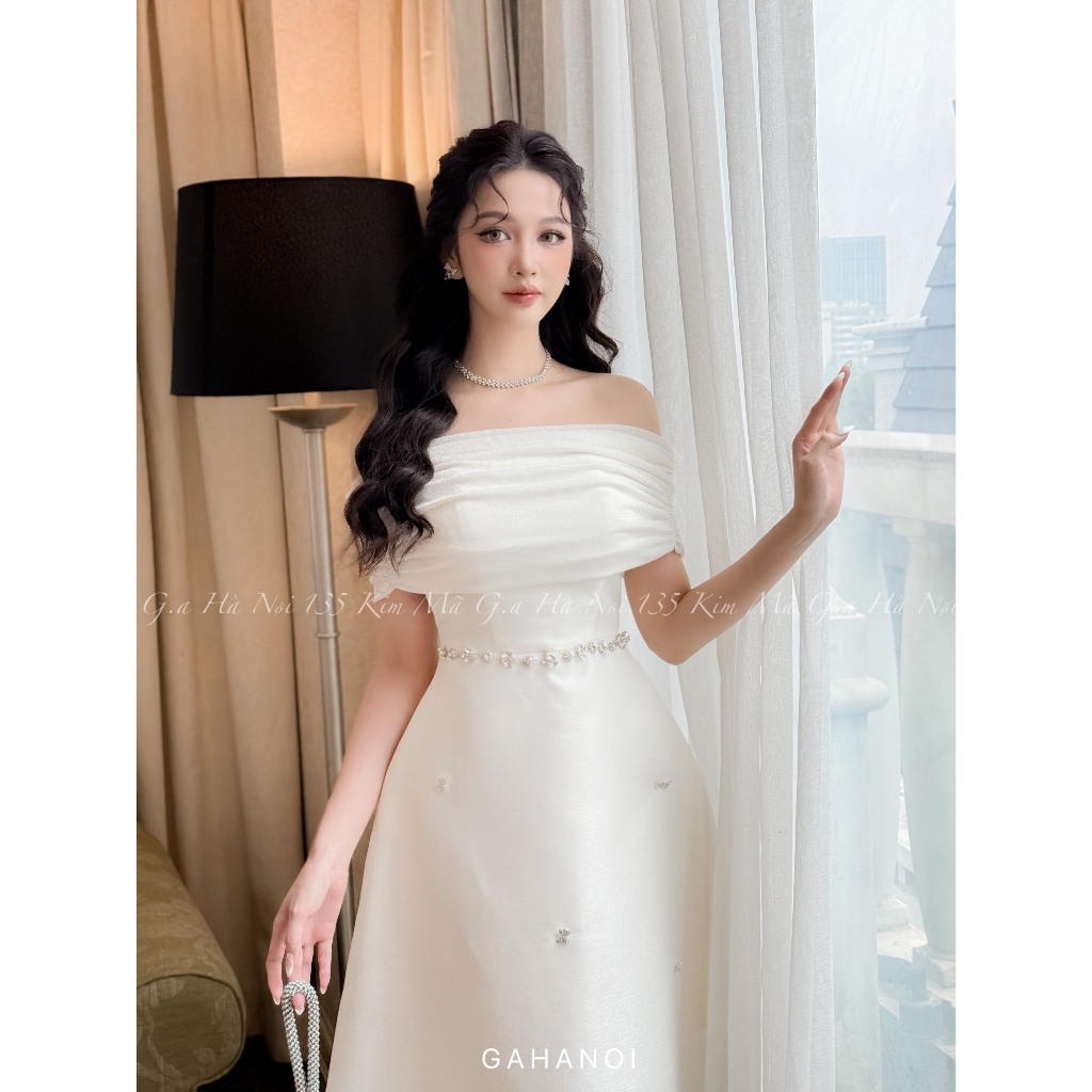 CENIA DRESS - Váy trắng trễ vai đính nơ đá sang chảnh tiểu thư.
