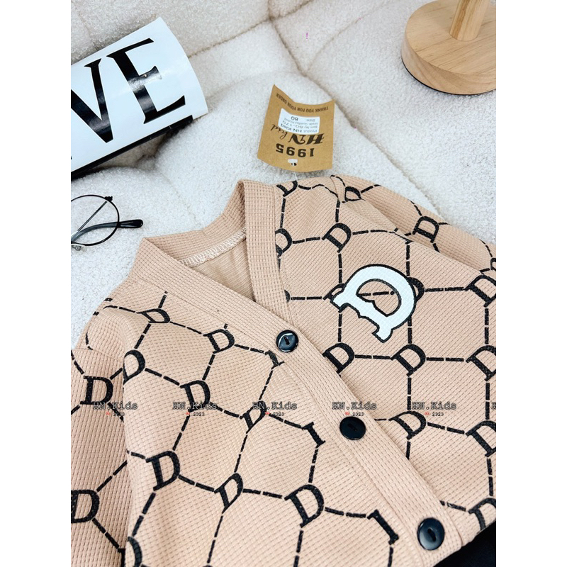 10-35kg set áo cadigan chữ D mix chân váy xếp ly cho bé gái