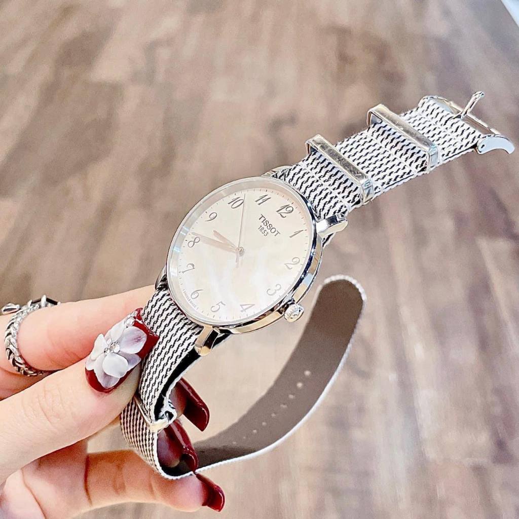 Đồng hồ nam nữ dây vải Tissot Every Time T109.410.18.032.00