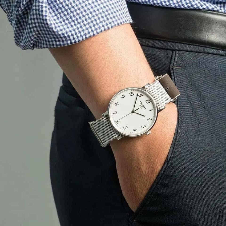 Đồng hồ nam nữ dây vải Tissot Every Time T109.410.18.032.00