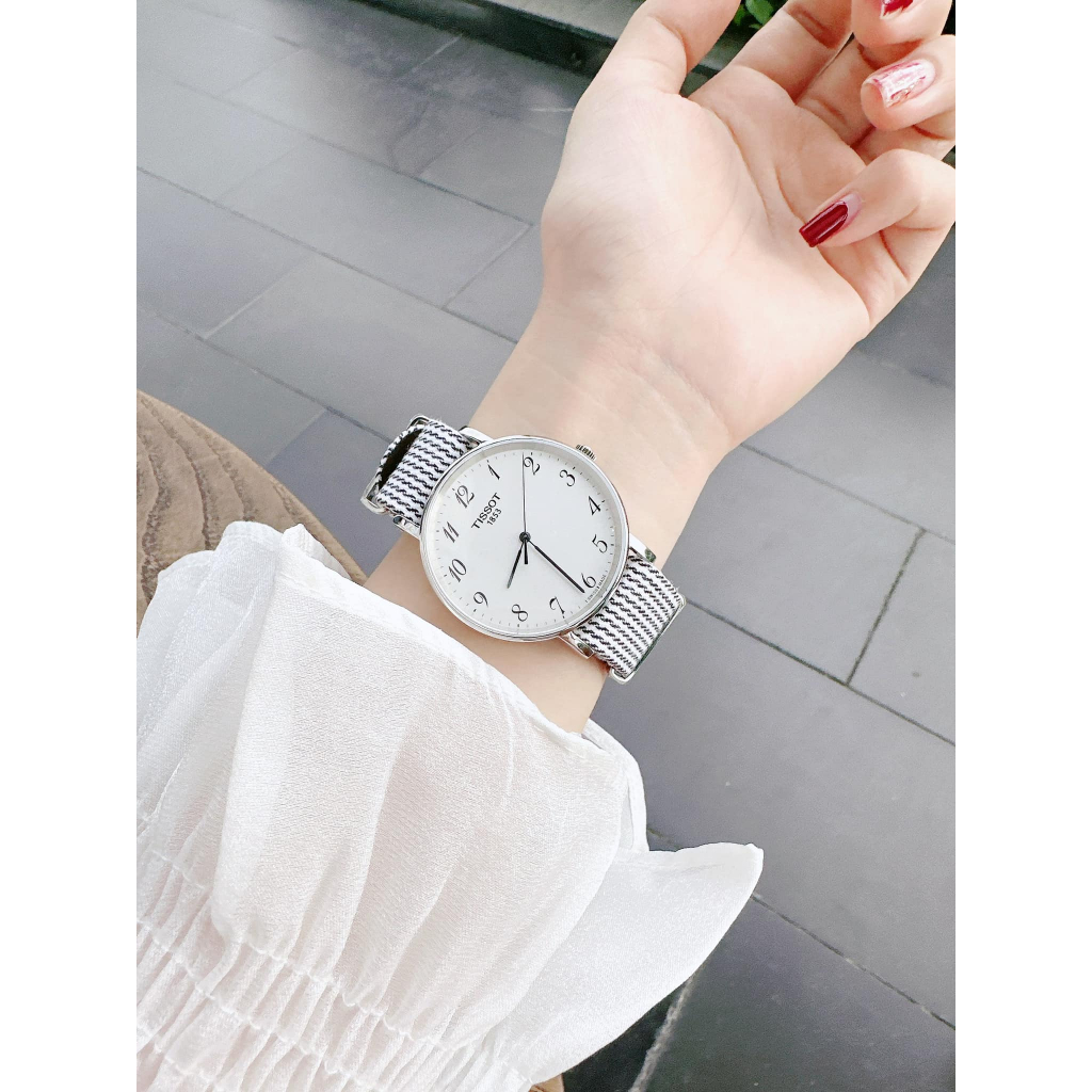 Đồng hồ nam nữ dây vải Tissot Every Time T109.410.18.032.00