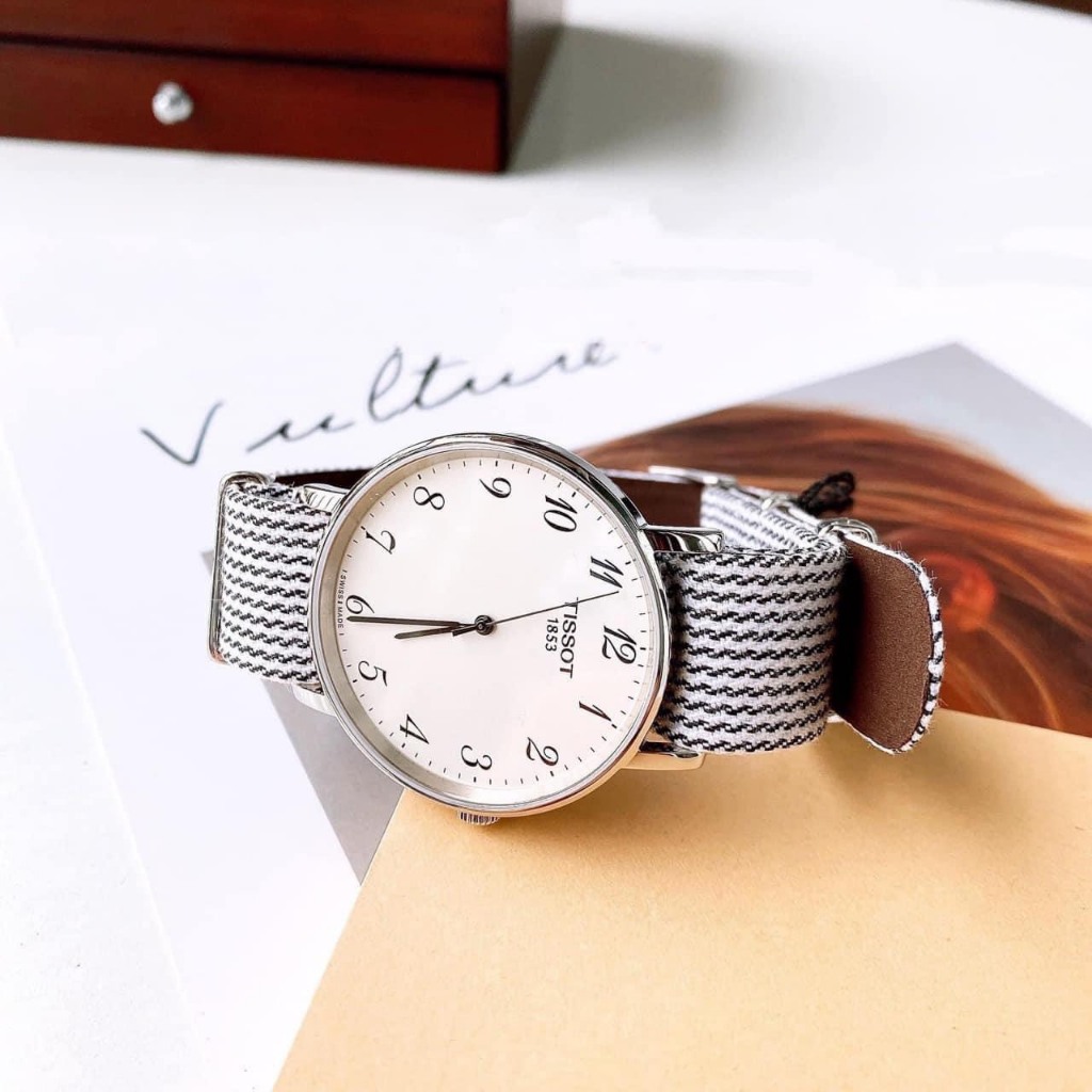 Đồng hồ nam nữ dây vải Tissot Every Time T109.410.18.032.00