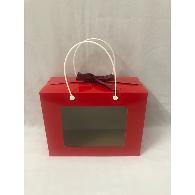 Hộp giấy gấp mặt kiếng có quai xách kích thước 20 x 26 x 12.2cm/hộp