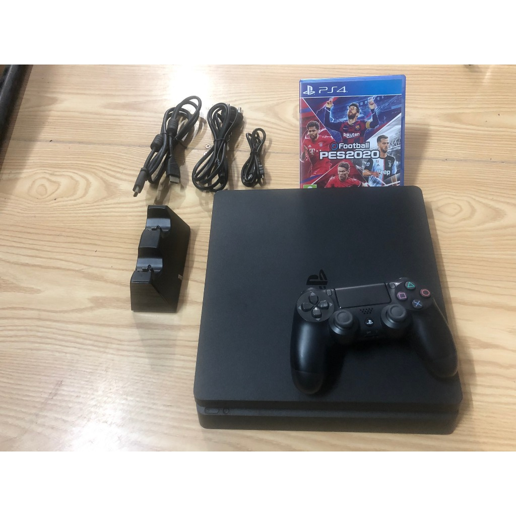 PS4 slim like new99% tặng kèm 1 tay cầm và tặng kèm sạc không dây cho tay cầm