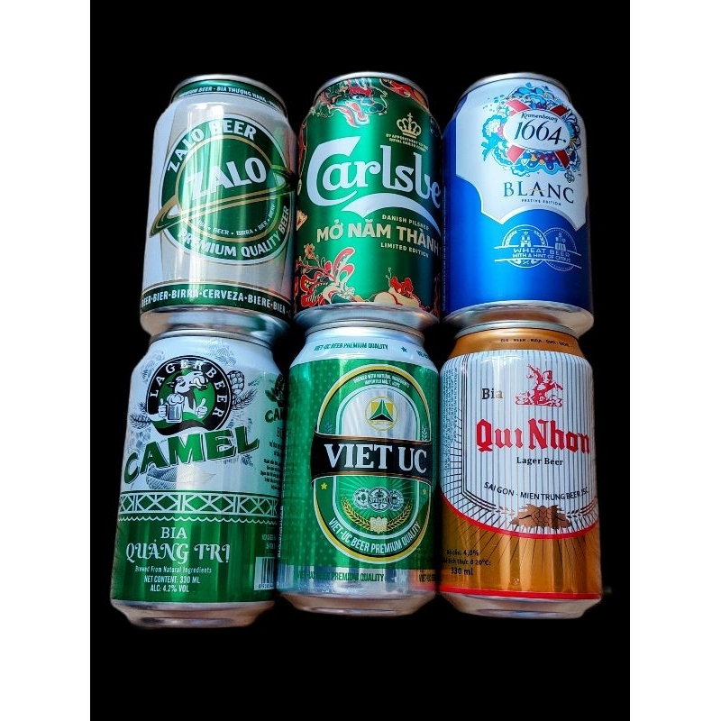 6 lon bia Việt Nam gồm Zalo, Carlsberg Xuân 2024, Blanc 1664 Xuân 2024, Camel, Việt Úc, Qui Nhơn date từ tháng 12 2023