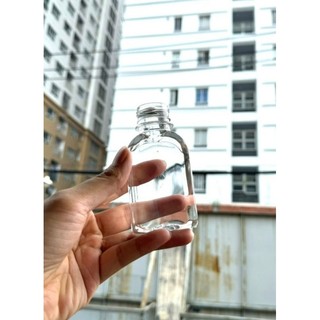 Chai 100ml Dẹp kèm nắp đen dùng đựng nước