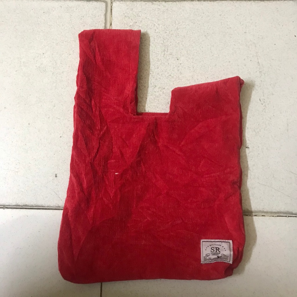 Túi cầm tay kiểu lạ vải nhung