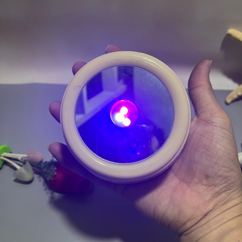 Đế xoay có led dây cót xoay phát nhạc - DX010