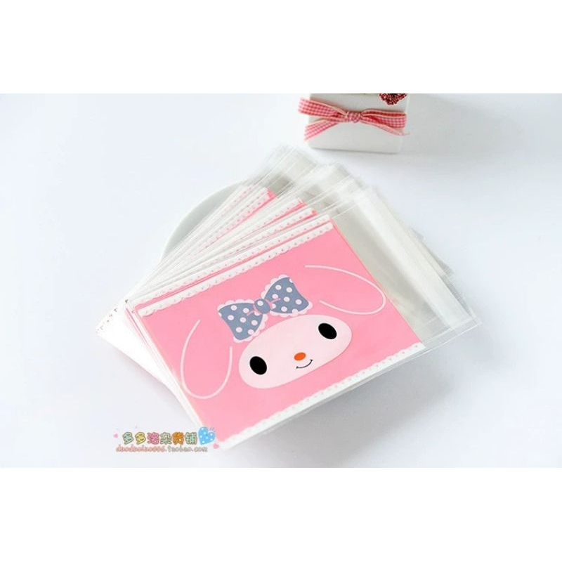 Set 100c Túi bóng kính Melody nơ xanh dán miệng size 10x13+3