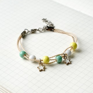 Vòng tay handmade hạt gốm đủ màu