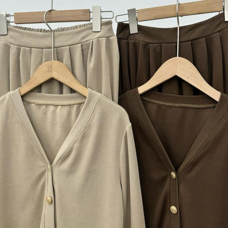 040 Set áo khoác kèm chân váy xếp ly chun sau