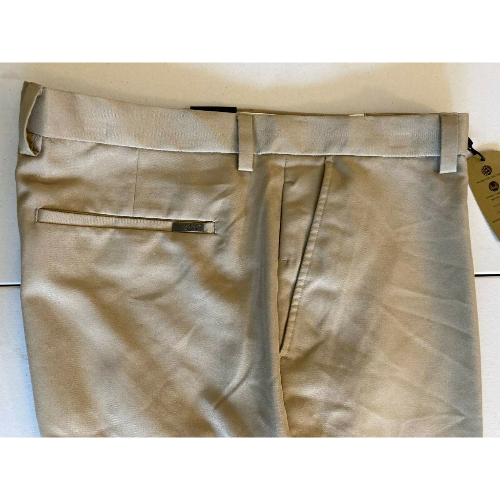 Quần golf Greg Norman Tasso Elba dành cho Nam. Chất vải mềm co giãn thoải mái. Form Slim-straight lên dáng gọn người.