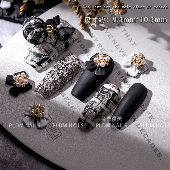 Charm nơ hoa ngọc đen trắng mẫu mới đính trang trí móng