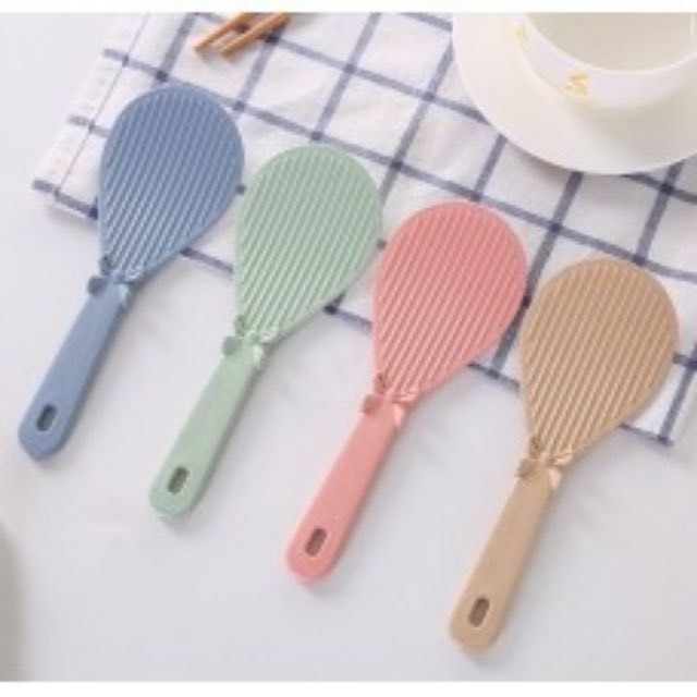 Muôi / Môi xới cơm hình nơ bằng nhựa chịu nhiệt an toàn