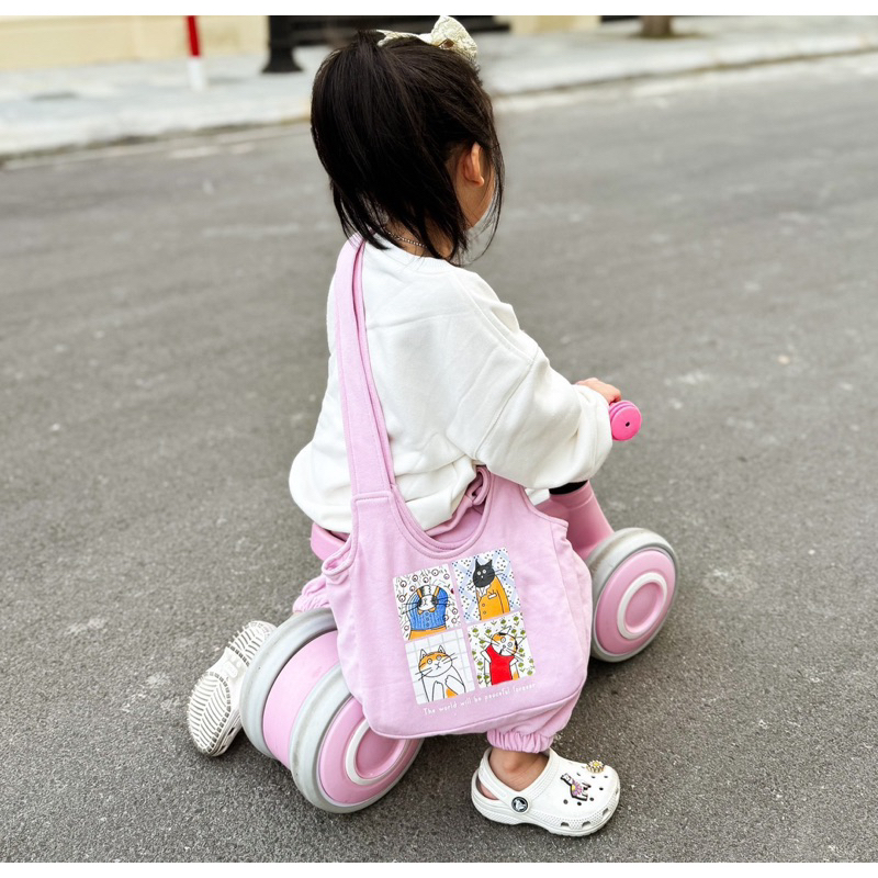 Bộ nỉ trắng hồng tặng kèm túi trẻ em VNXK