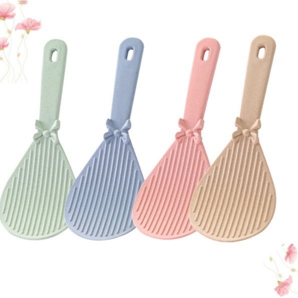 Muôi / Môi xới cơm hình nơ bằng nhựa chịu nhiệt an toàn