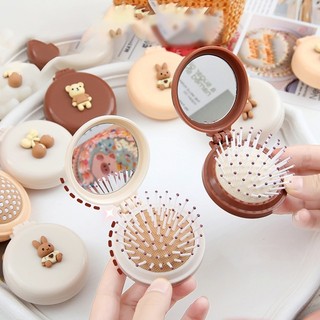 Gương gấp mini kèm lược massage gỡ rối hoạt hình tiện lợi