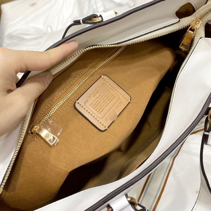 TÚI COACH LOGAN CARRYALL