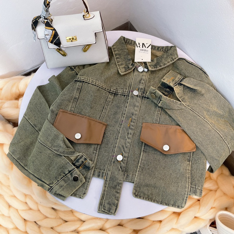 KHOÁC BÒ PHỐI TÚI DA CHẤT LỪ