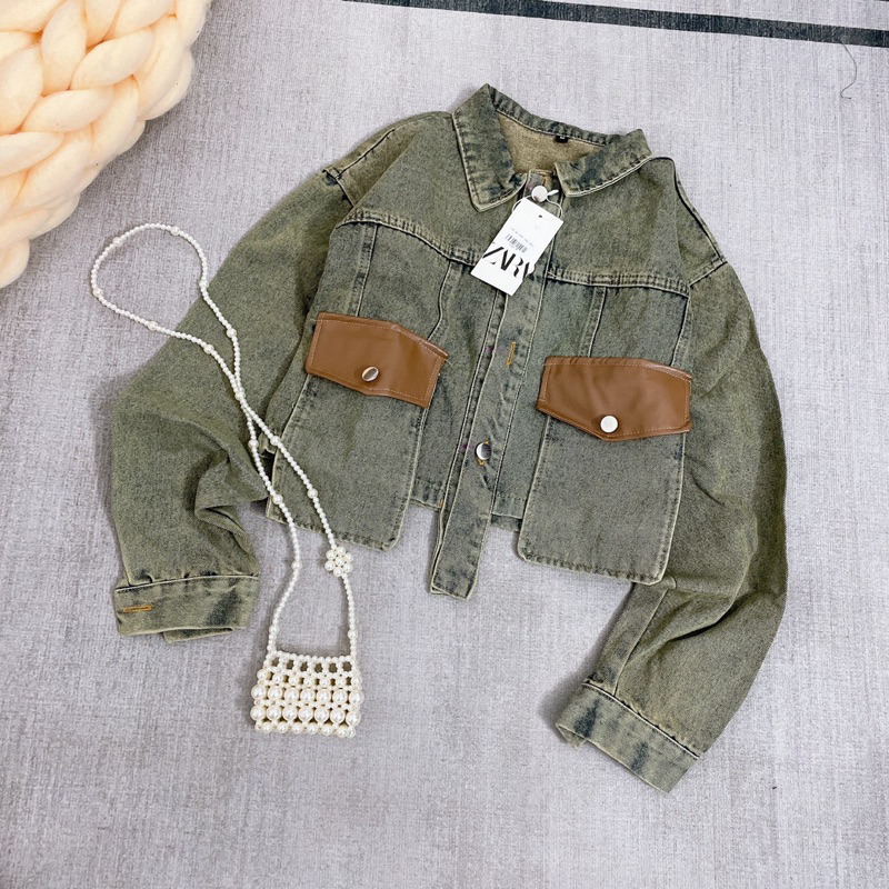 KHOÁC BÒ PHỐI TÚI DA CHẤT LỪ