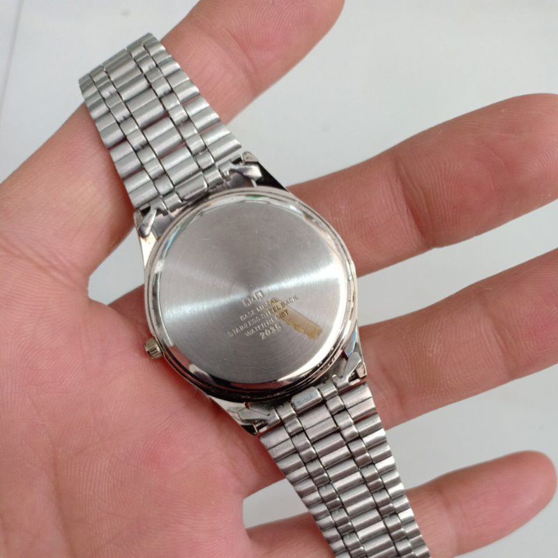 Đồng hồ nam si nhật hiệu Q&Q FALCON dây thép lụa màu bạc độ mới 90%