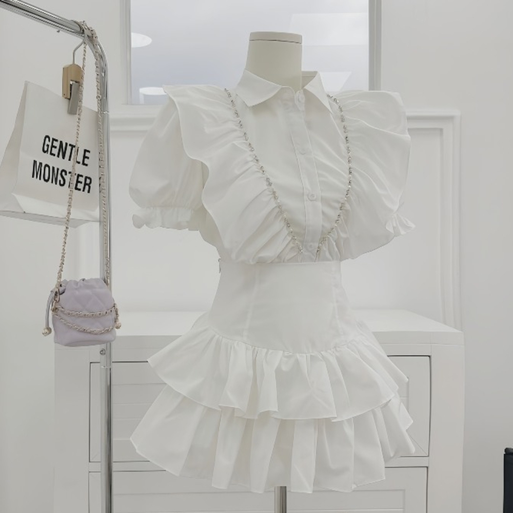 Set áo bèo cổ sơ mi phối viền đá mix chân váy tâng xoè, phù hợp với cô nàng thích phong cách tiểu thư bánh bèo