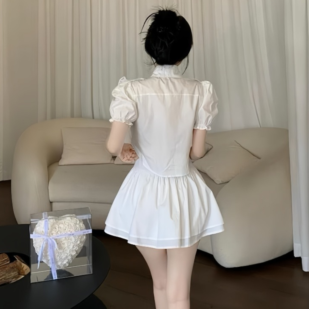 Set áo bèo cổ sơ mi phối viền đá mix chân váy tâng xoè, phù hợp với cô nàng thích phong cách tiểu thư bánh bèo