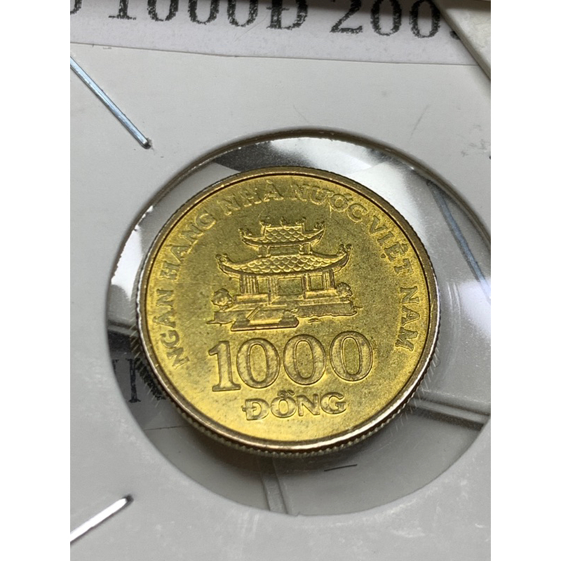 Xu năm 2003 1000 đồng mới còn óng ánh