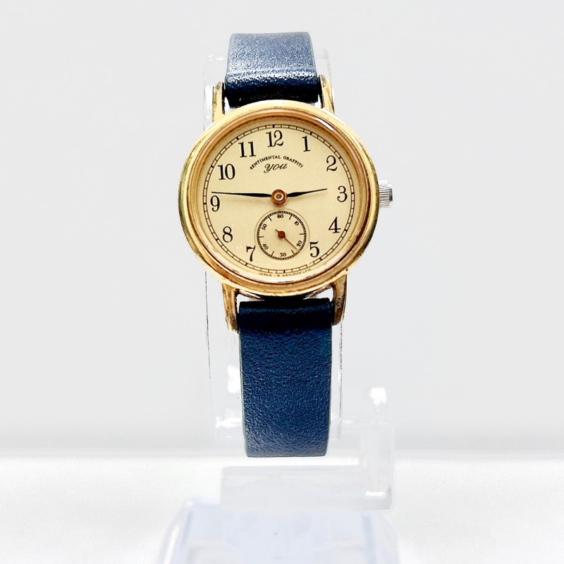 Đồng hồ nữ si hiệu Orient, chạy kim rốn, dây da mặt tròn