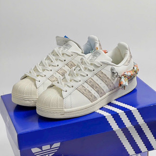 Giày sneaker sò kem phối dây quai nơ