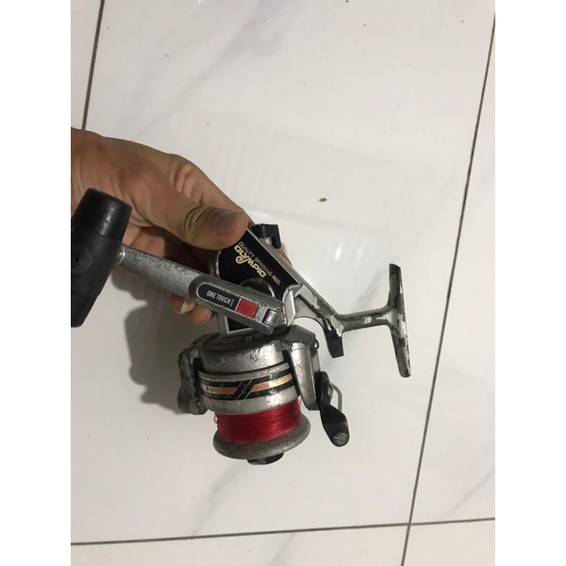 Máy câu Olympic LX2500 size thực 5000