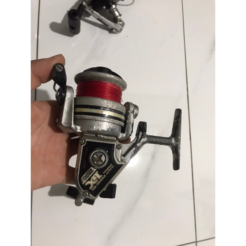 Máy câu Olympic LX2500 size thực 5000