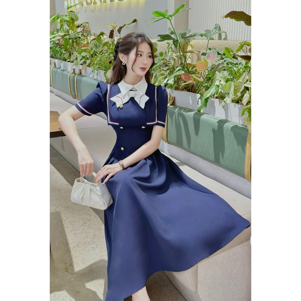 Khâu váy thiết kế xanh lé nơ trắng sang chảnh phù hợp đi làm đi chơi