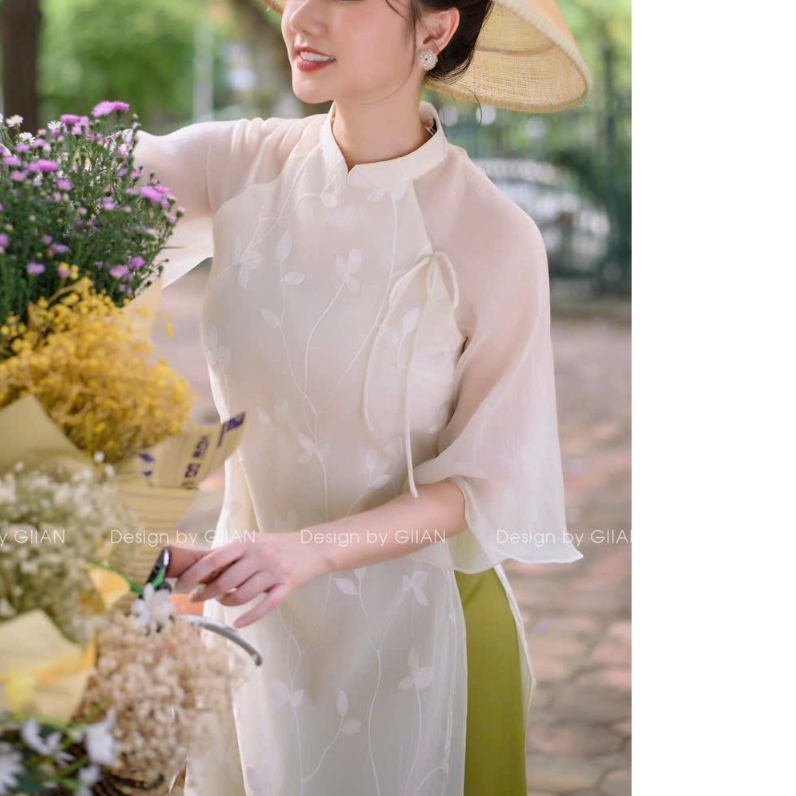 Áo dài cách tân nữ xuông 4 tà Nhã Trúc may sẵn áo dài lụa tơ thêu hình hoa giá xưởng