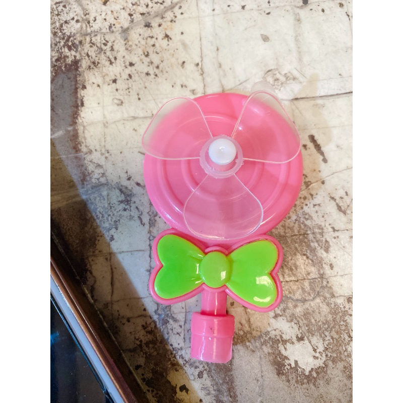 Vỉ 30 cây kẹo xê kèm đồ chơi hình bông hoa