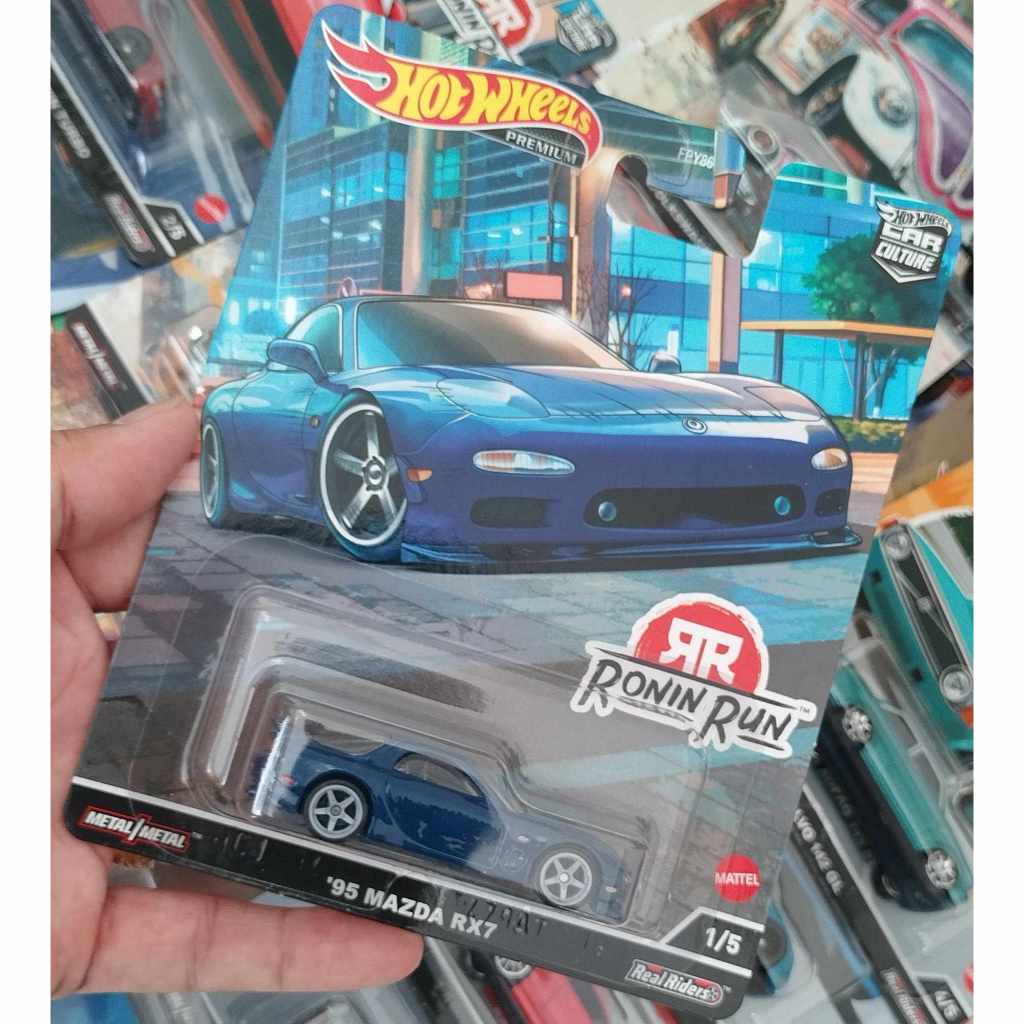 Xe Hotwheels 95 Mazda RX7 Premium (Bánh Cao Su, Màu Xanh)