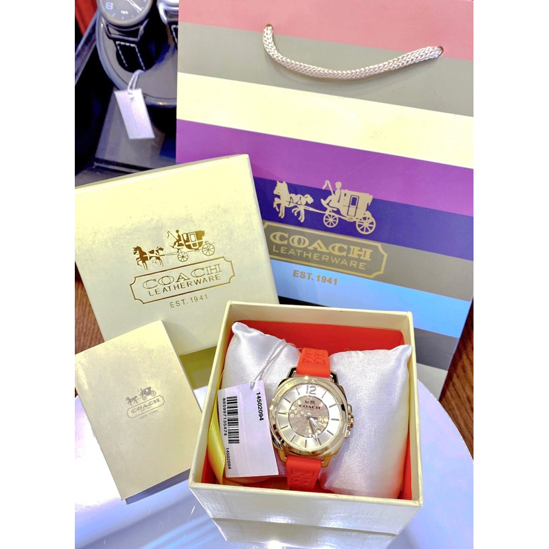 Đồng hồ nữ Coack mặt tròn dây silicon