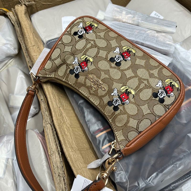 Túi coach dáng thuyền hoạ tiết