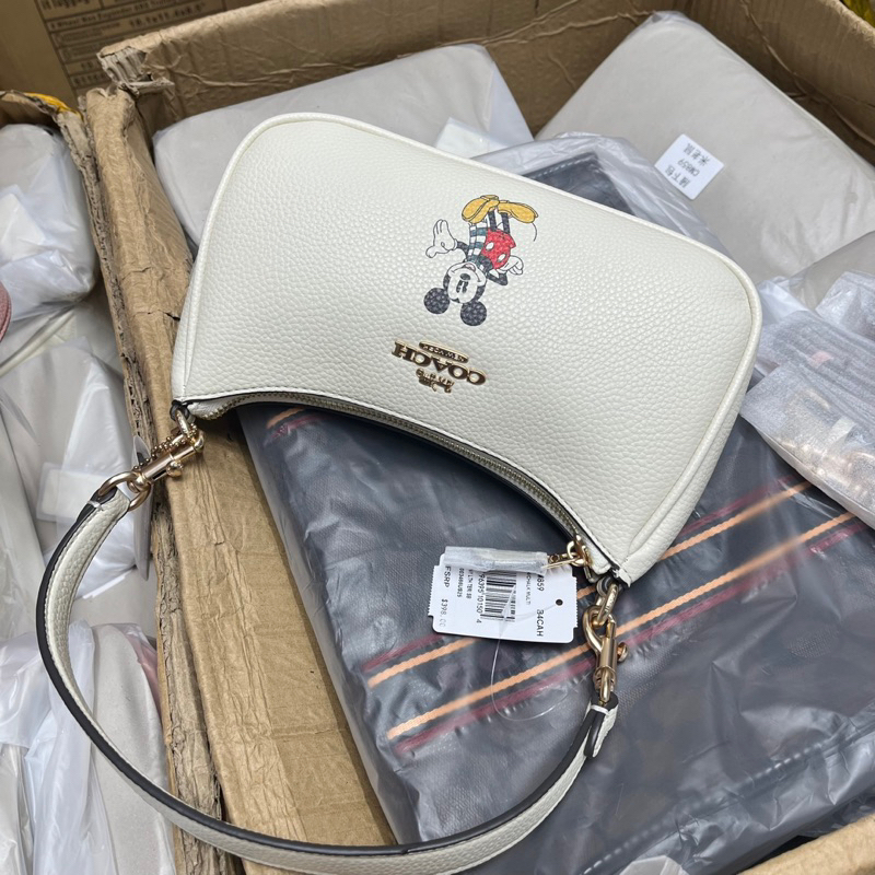 Túi coach dáng thuyền hoạ tiết