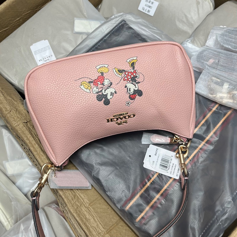 Túi coach dáng thuyền hoạ tiết