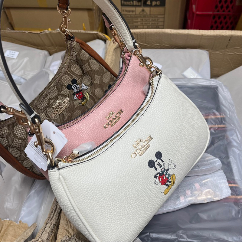 Túi coach dáng thuyền hoạ tiết