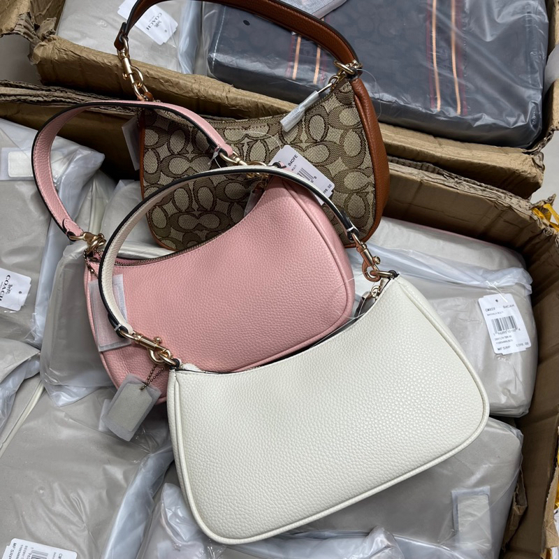 Túi coach dáng thuyền hoạ tiết