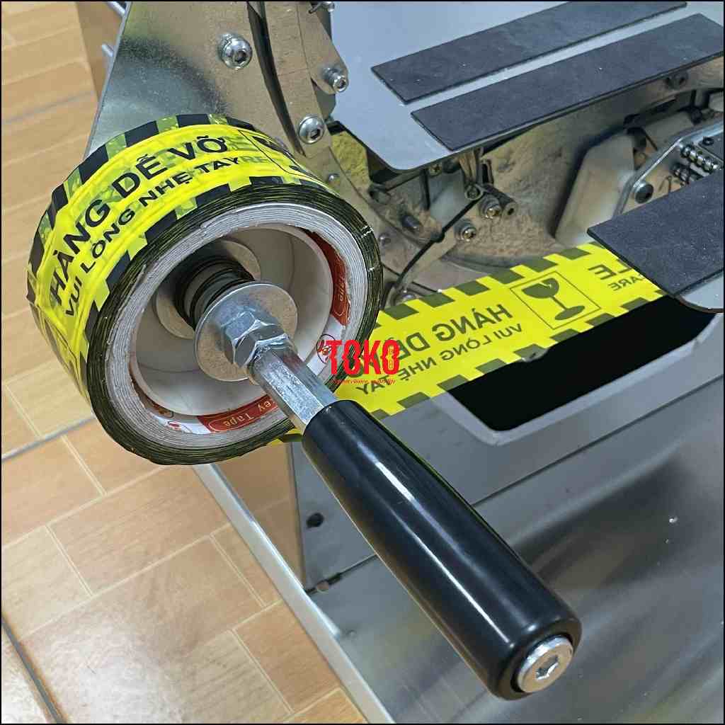 Máy quấn băng dính đóng hàng KINSON