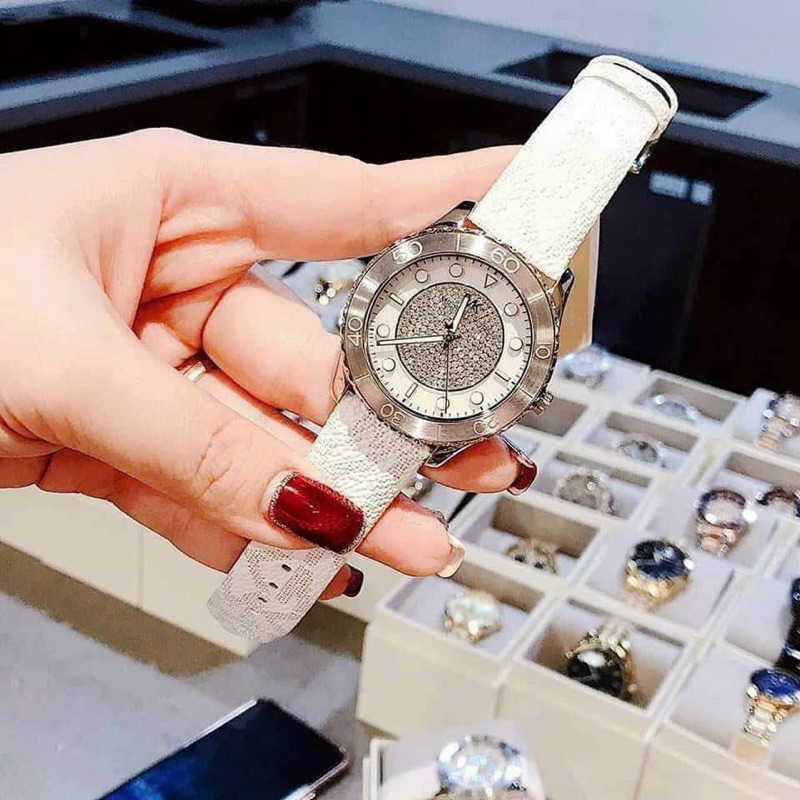 Đồng hồ nữ Michael Kors MK6998 mặt tròn dây da màu trắng