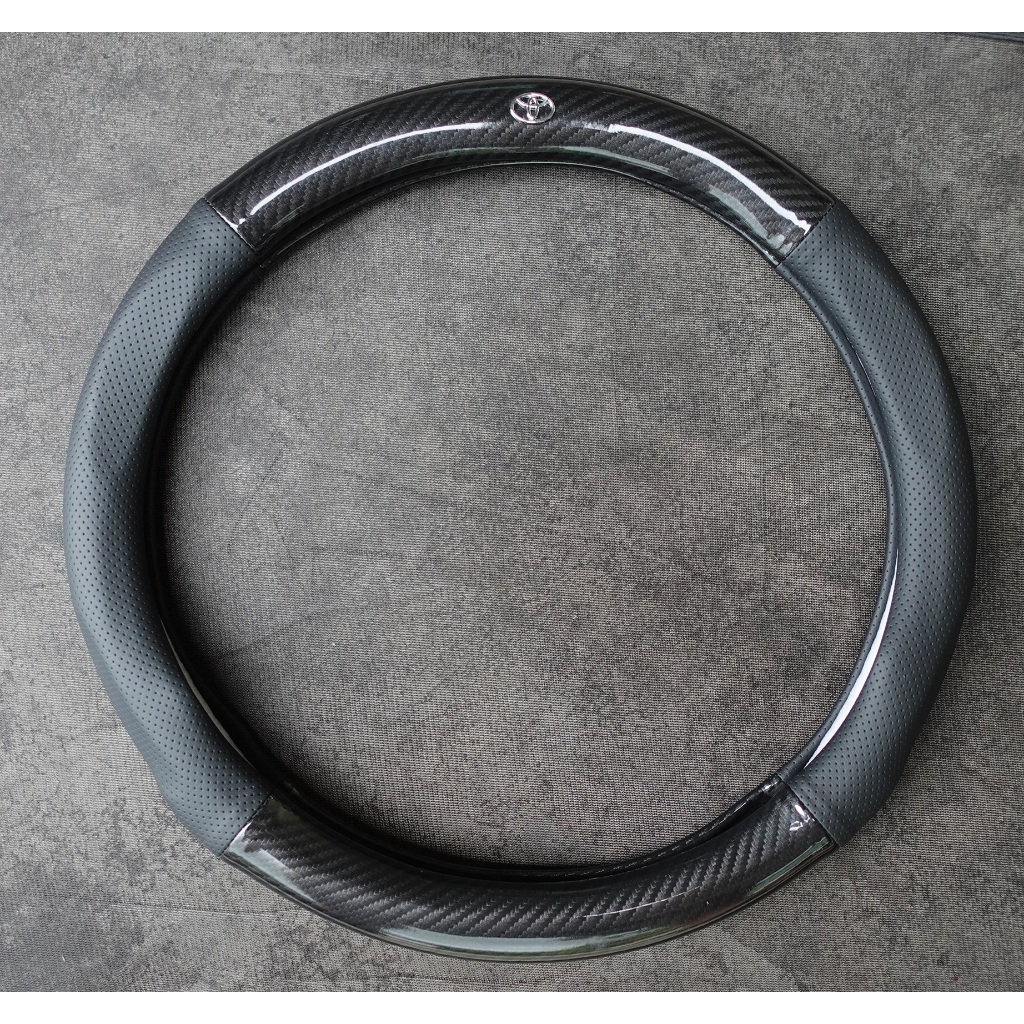 Bọc vô lăng Toyota Vios, Innova, Fortuner, Camry, Altis, Yaris, Land Cruise, Hilux, Avalon, Trùm vô lăng cacbon bảo vệ