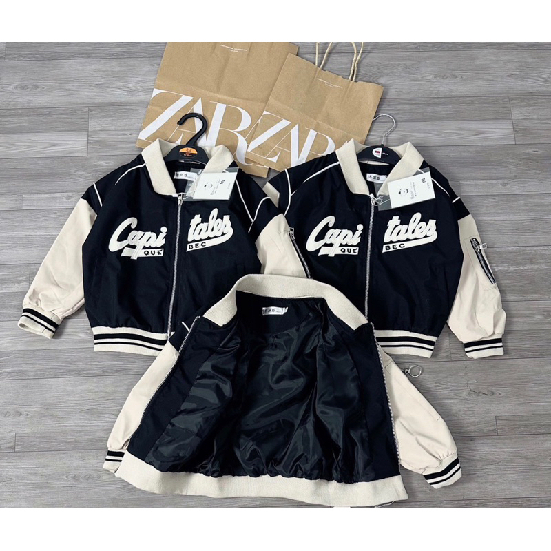 Áo khoác gió bomber 2 lớp chữ thêu đáp nổi phối màu đen be cho bé